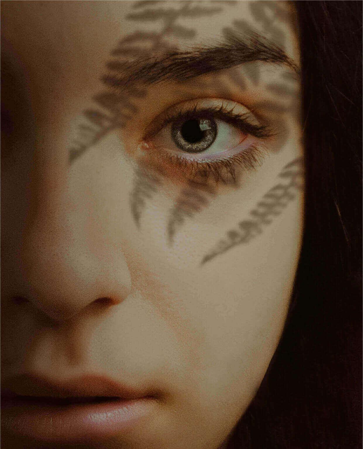 Close up of a woman's face, who has amazing lashes.