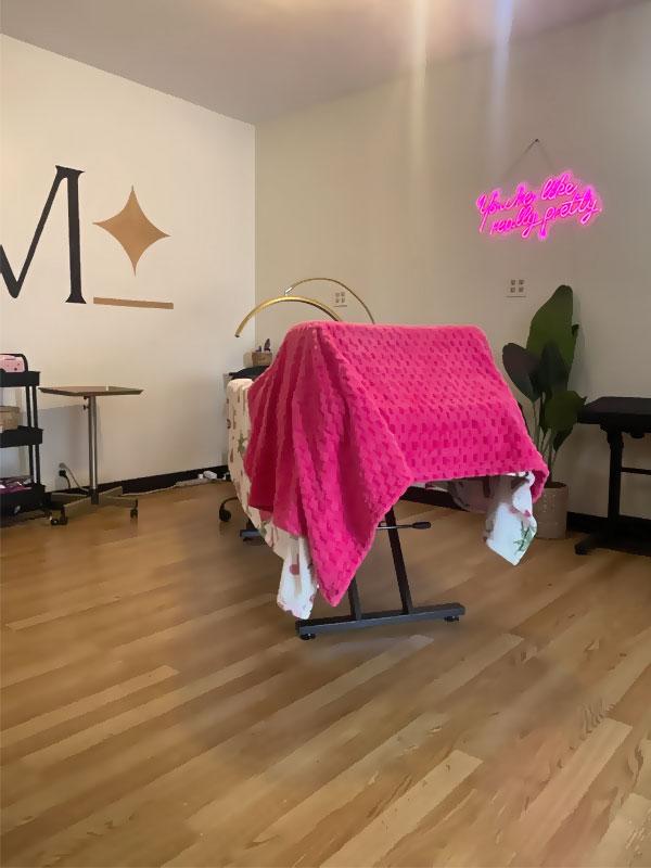 Interior of one of Moxie Beauty Studio's treatment rooms
